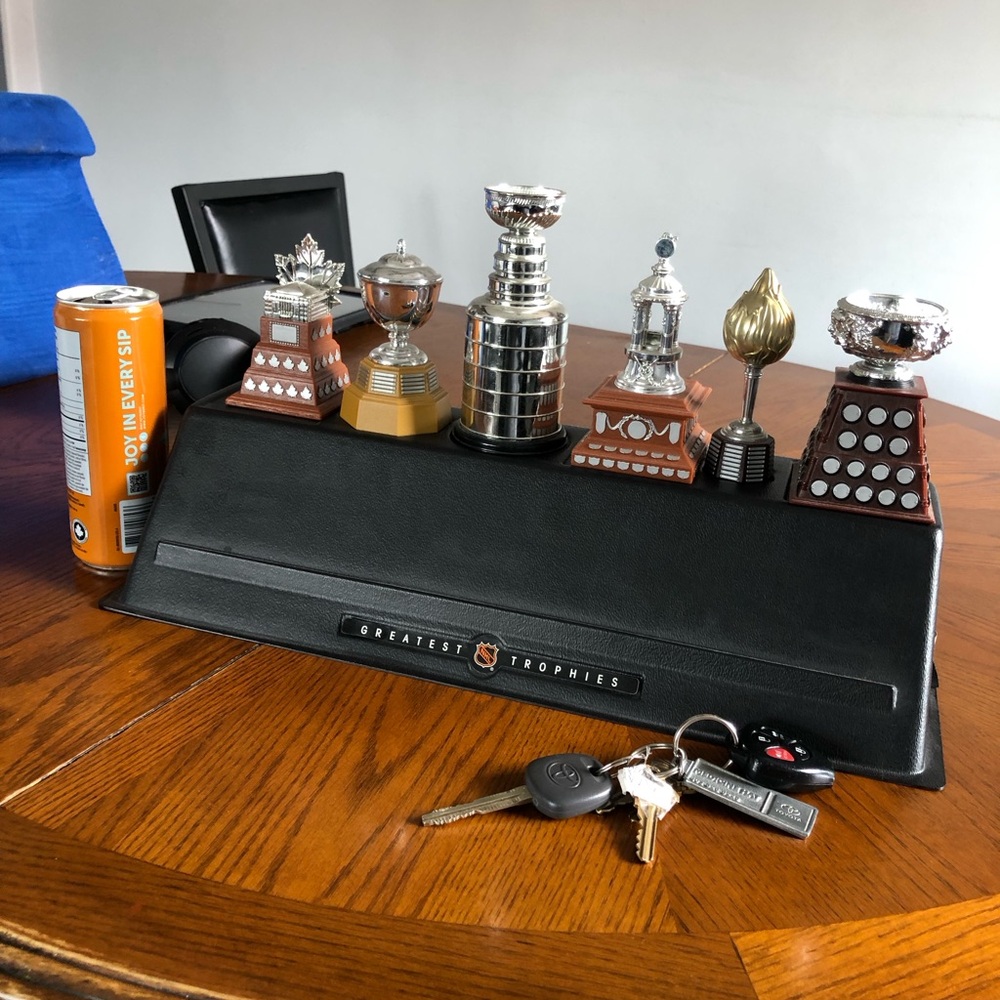 McDonald's Black Desk Trophy Display with Silver and Brown Trophies